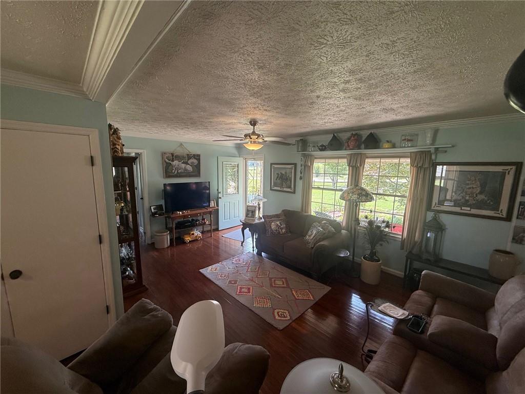 2705 Collard Valley Road Cedartown, GA 30125 - Photo 29 of 49 a living room with furniture and wooden floor