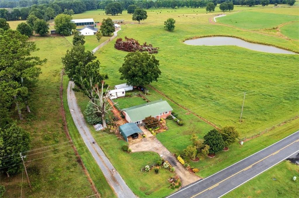 2705 Collard Valley Road Cedartown, GA 30125 - Photo 3 of 49 a view of a lake with a yard