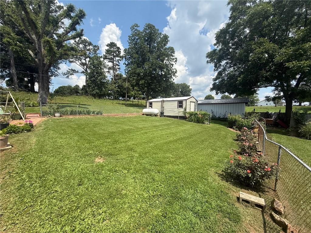 2705 Collard Valley Road Cedartown, GA 30125 - Photo 32 of 49 a view of a lake with a yard