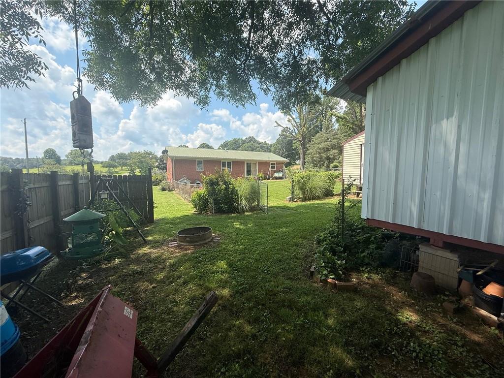 2705 Collard Valley Road Cedartown, GA 30125 - Photo 34 of 49 a view of a house with backyard and garden