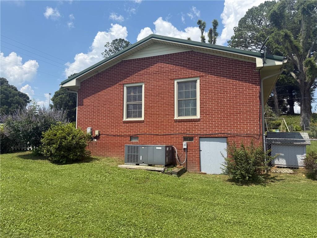 2705 Collard Valley Road Cedartown, GA 30125 - Photo 37 of 49 a front view of a house with a yard