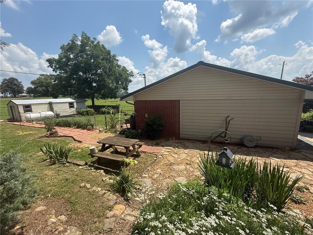 2705 Collard Valley Road Cedartown, GA 30125 - Photo 42 of 49 a backyard of a house with lots of green space