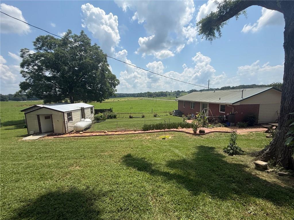2705 Collard Valley Road Cedartown, GA 30125 - Photo 43 of 49 a view of a house with backyard