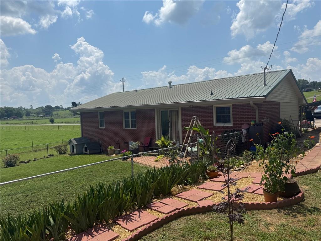 2705 Collard Valley Road Cedartown, GA 30125 - Photo 44 of 49 a front view of a house with garden