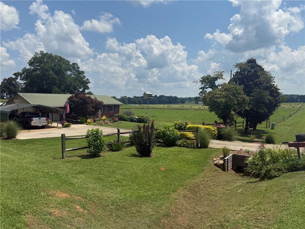 2705 Collard Valley Road Cedartown, GA 30125 - Photo 47 of 49 a view of a garden with sitting area