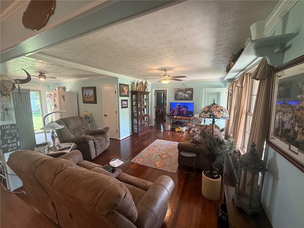2705 Collard Valley Road Cedartown, GA 30125 - Photo 9 of 49 a living room with furniture and a flat screen tv