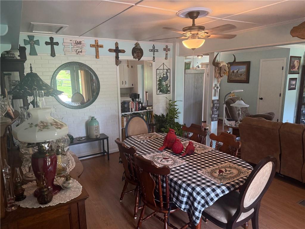 2705 Collard Valley Road Cedartown, GA 30125 - Photo 10 of 49 a very nice looking dining room with a table and chairs