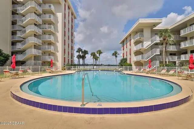 a view of outdoor space and swimming pool