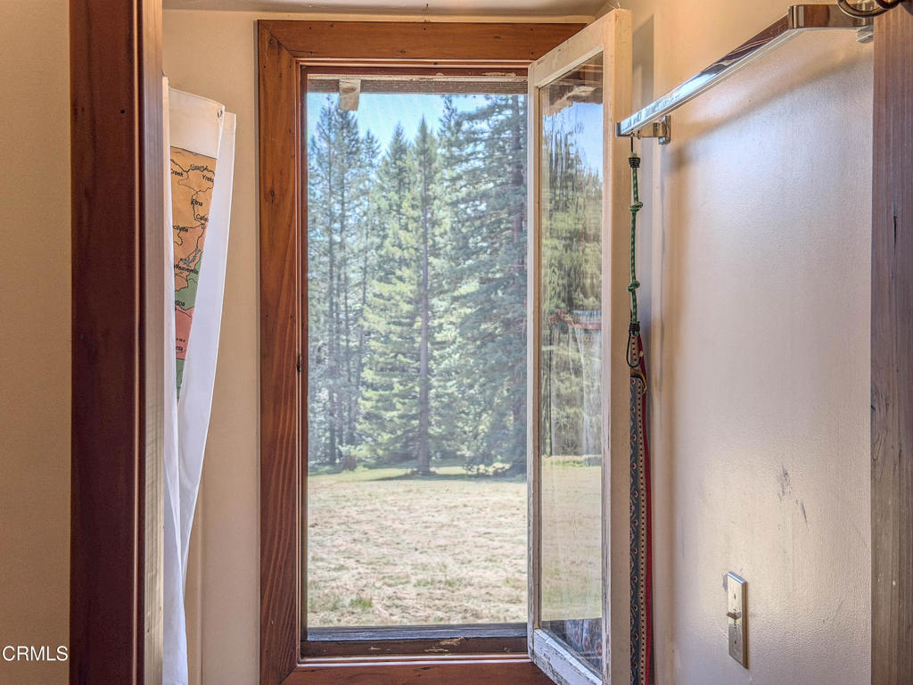 28680 Comptche Ukiah Road Comptche, CA 95427 - Photo 45 of 58 a view of a glass door with a from a window