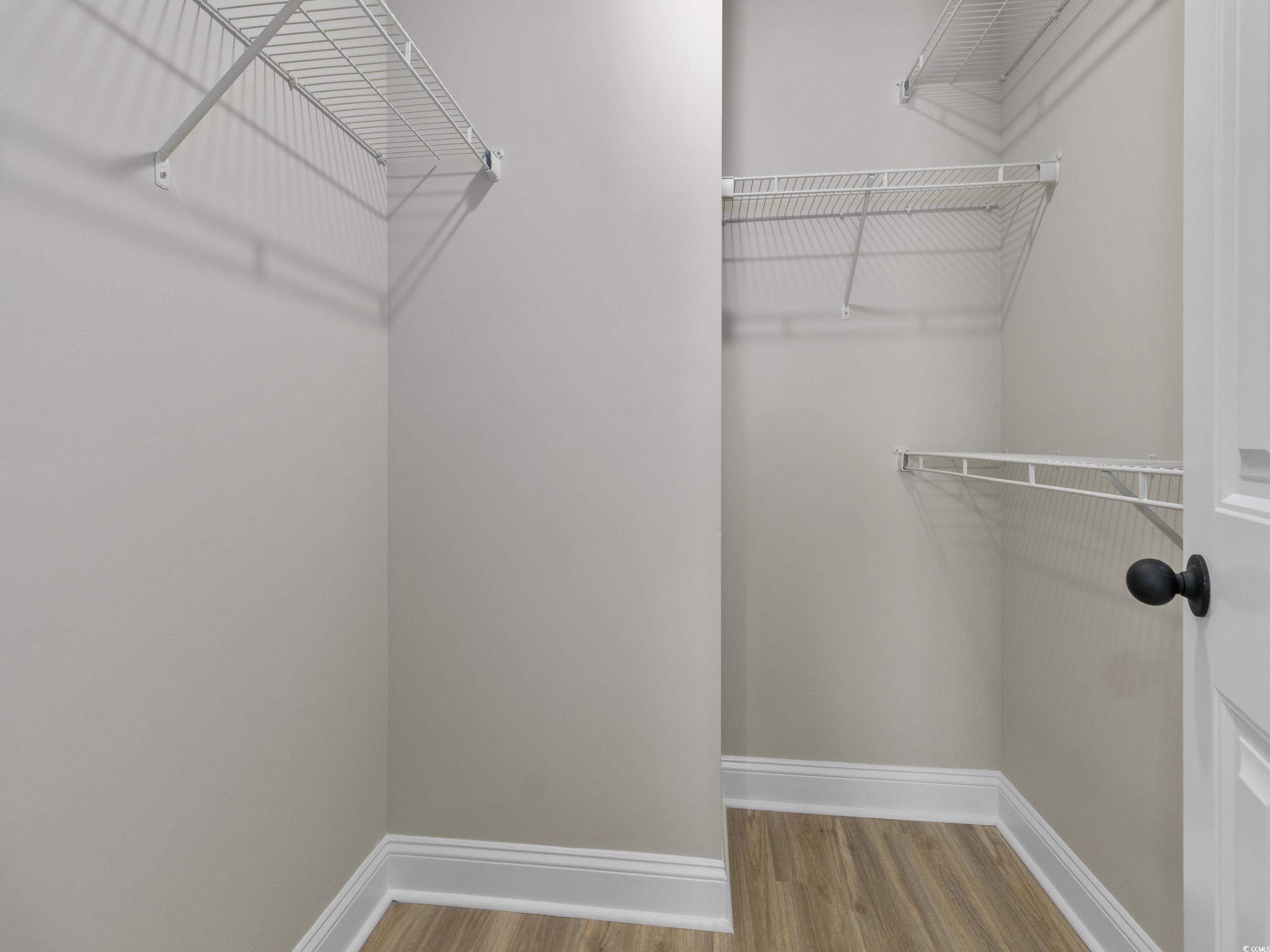 837 Highway 67 Loris Sc 29569 Loris, SC 29569 - Photo 23 of 31 Spacious closet with wood finished floors