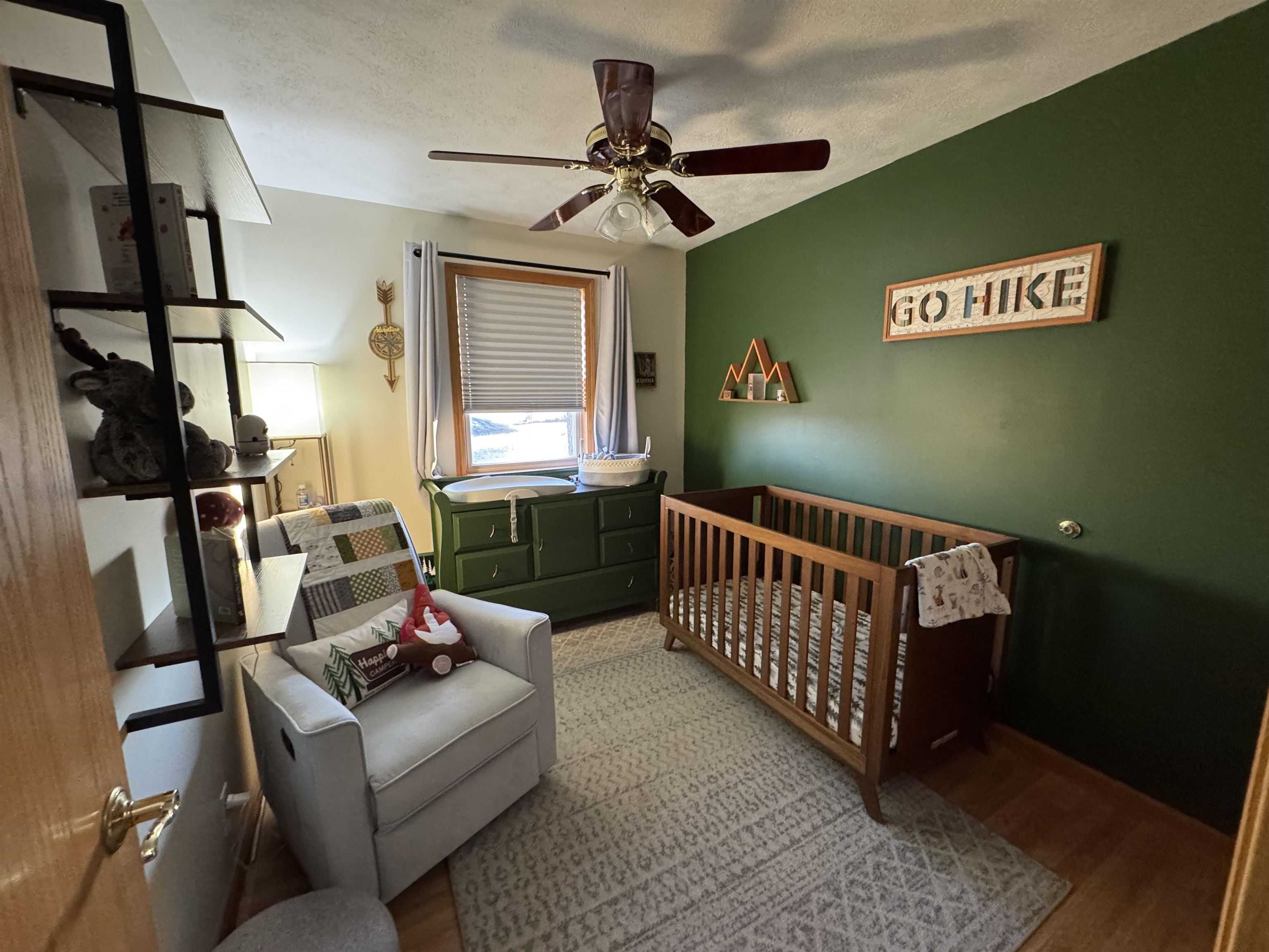 57 Herbert Road Kingston, IL 60145 - Photo 4 of 10 a bedroom with furniture and a window