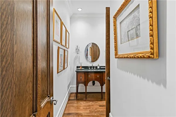 a kitchen with stainless steel appliances a sink and a large window