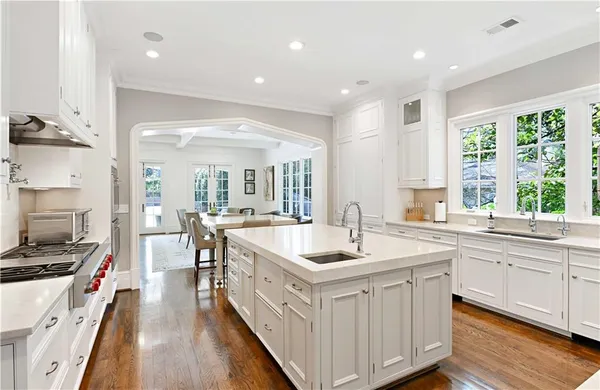 a living room with furniture fireplace and flat screen tv