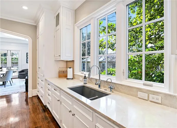 a living room with fireplace furniture and a flat screen tv