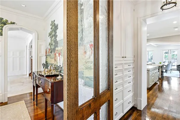 a spacious bedroom with a large bed and a couch