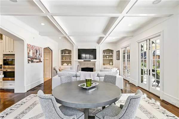 a kitchen with a sink a counter top space and cabinets