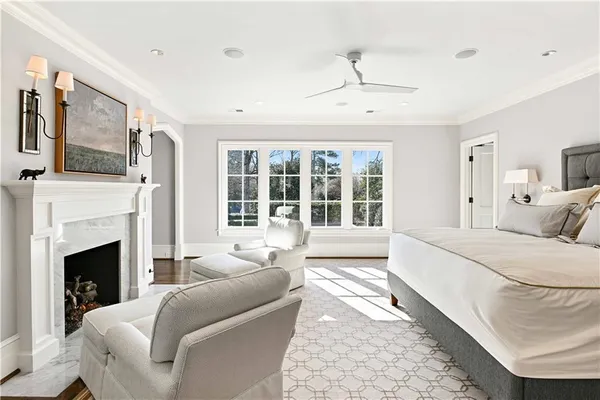 a living room with furniture window and flat screen tv
