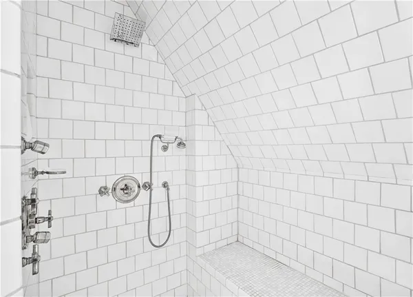 a bedroom with furniture and windows