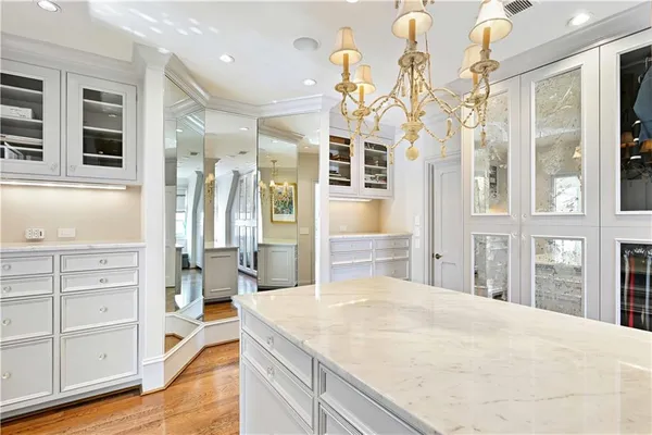 an aerial view of a house with swimming pool garden and patio