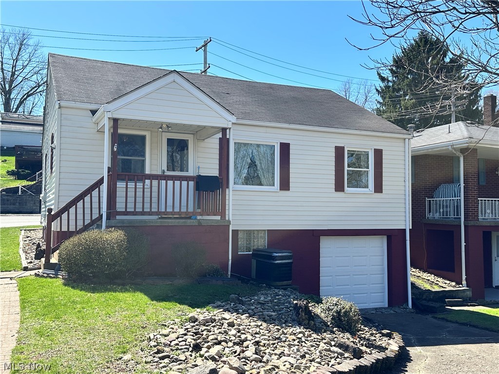 102 Beech Road Weirton, WV 26062 - Photo 20 of 23 Back of home featuring a garage and porch