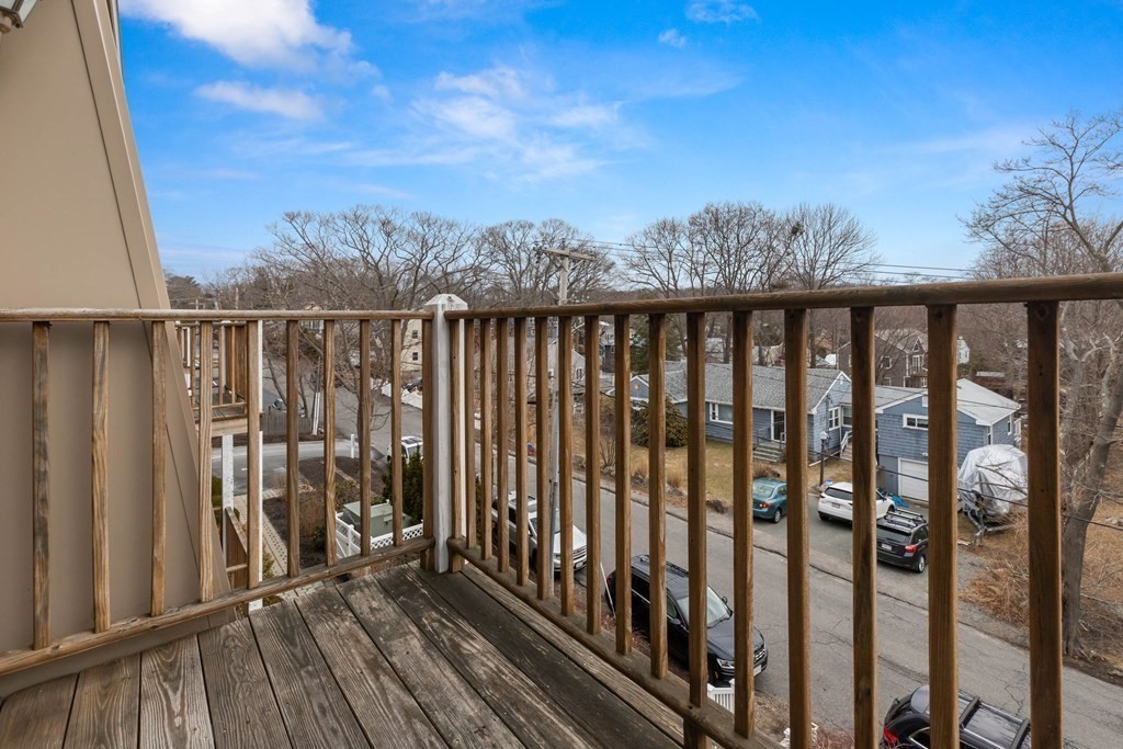 2 Ocean Avenue, Unit 3D Gloucester, MA 01930 - Photo 29 of 30 a view of a balcony with wooden fence