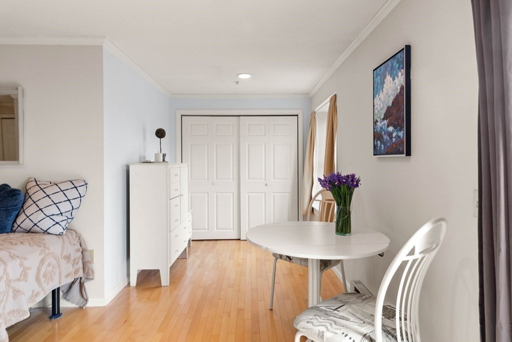 2 Ocean Avenue, Unit 3D Gloucester, MA 01930 - Photo 8 of 30 a view of a livingroom with furniture and wooden floor