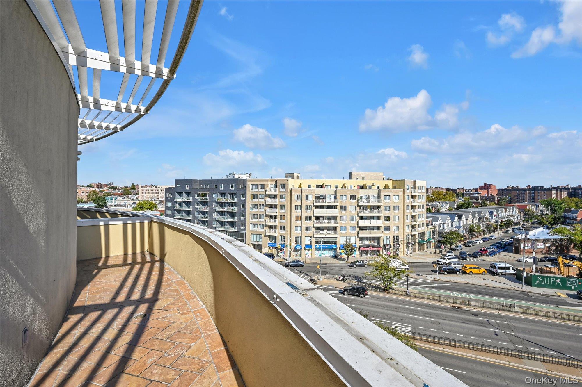 81-14 Queens Boulevard, Unit PH6C Queens, NY 11373 - Photo 14 of 19 Balcony featuring a city view