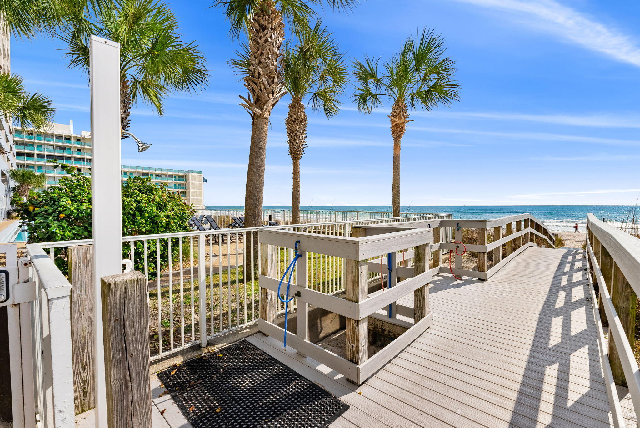 14415 Front Beach Road, Unit 1305 Panama City Beach, FL 32413 - Photo 33 of 47 a balcony with wooden floor and fence