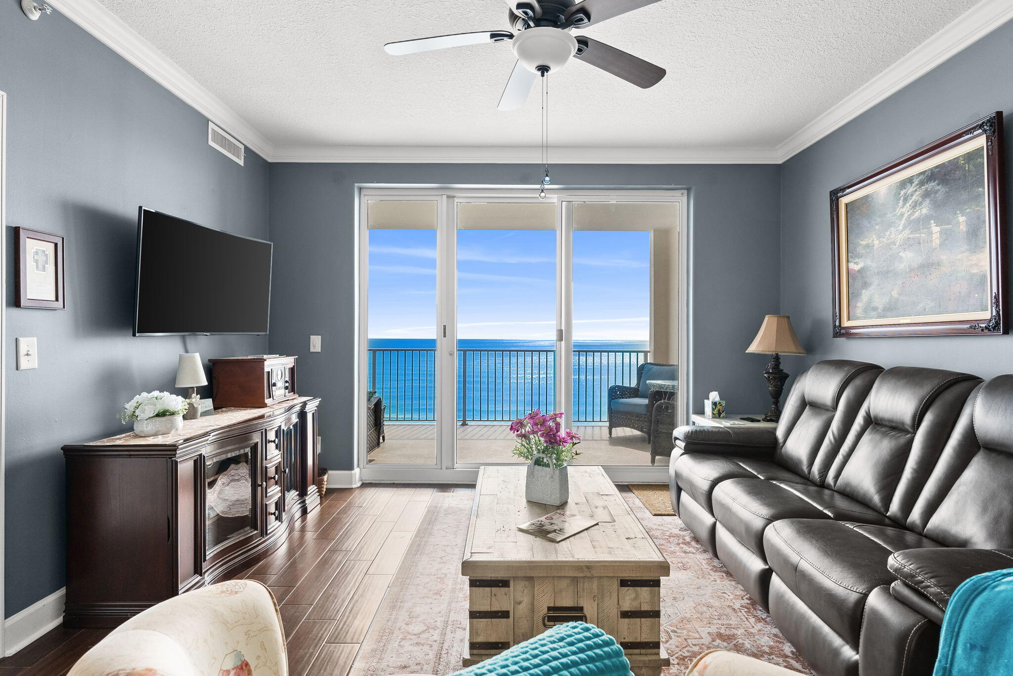14415 Front Beach Road, Unit 1305 Panama City Beach, FL 32413 - Photo 6 of 47 a work room with furniture or chandelier and a wooden floor