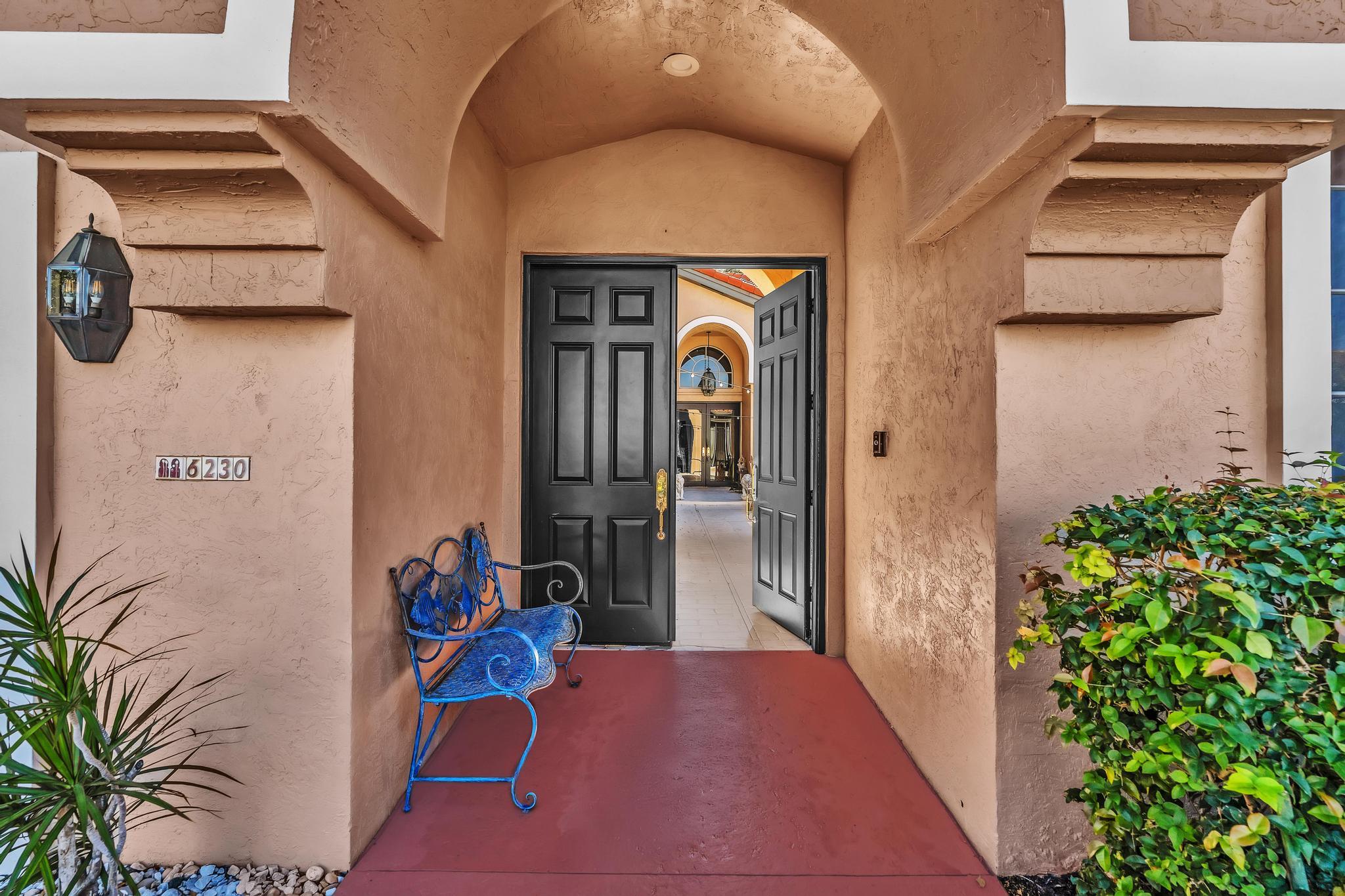 6230 Northwest 23rd Street Boca Raton, FL 33434 - Photo 2 of 90 a view of front door of house