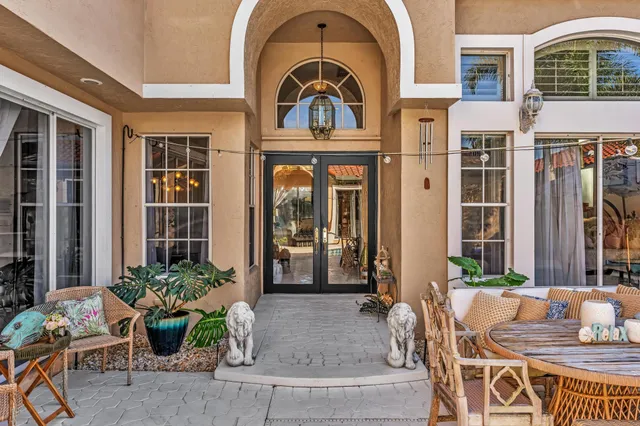 a picture of a bench in front of a building