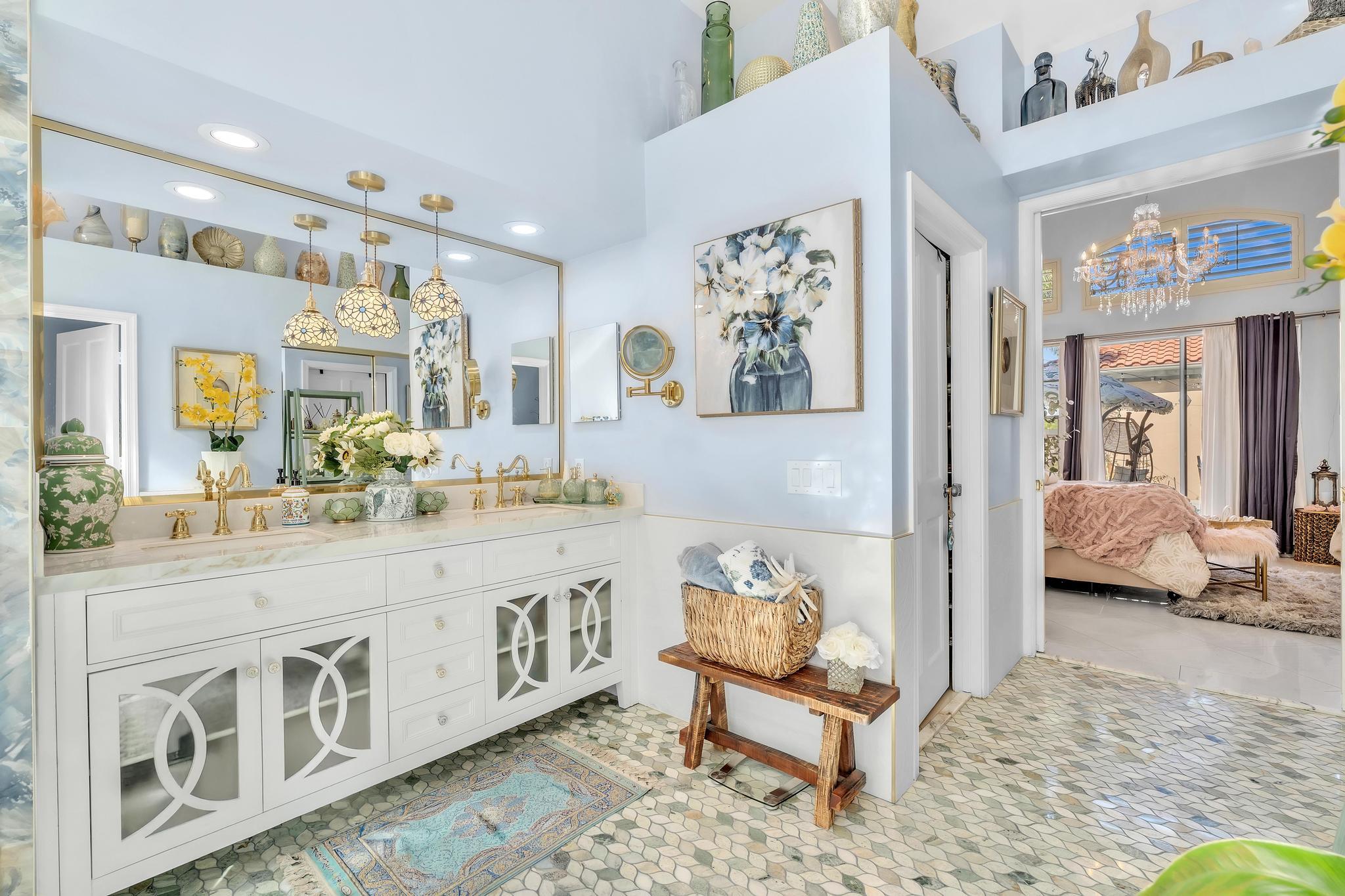 6230 Northwest 23rd Street Boca Raton, FL 33434 - Photo 44 of 90 a spacious en suite bathroom with sink and mirror