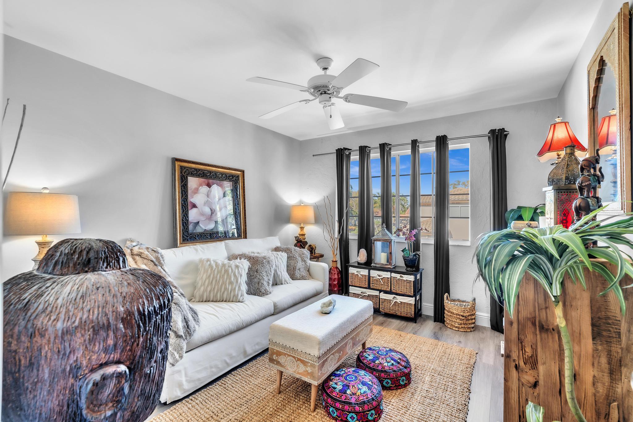 6230 Northwest 23rd Street Boca Raton, FL 33434 - Photo 49 of 90 a bedroom with furniture and a large window