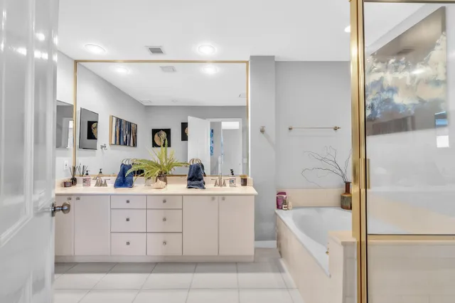 a view of a cafe with a table and chairs under an umbrella