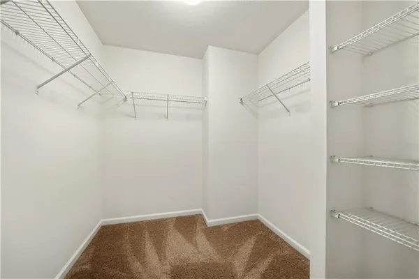 a view of small space with racks on the wall