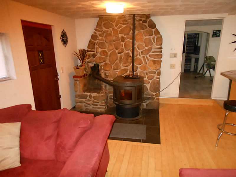 73 Burnt Hill Road Scituate, RI 02831 - Photo 5 of 24 Living Room. With pellet stove