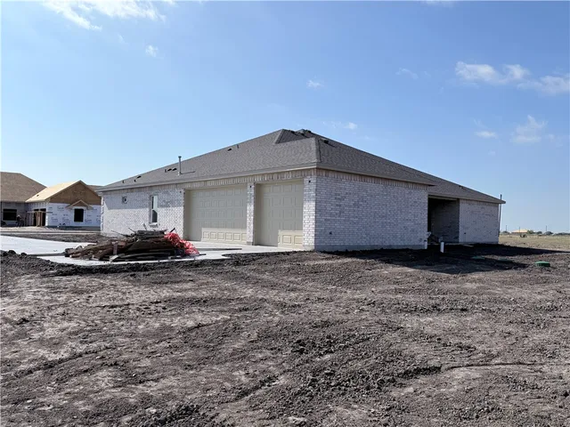 a house view with a backyard space