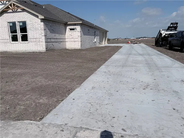 a view of backyard of house