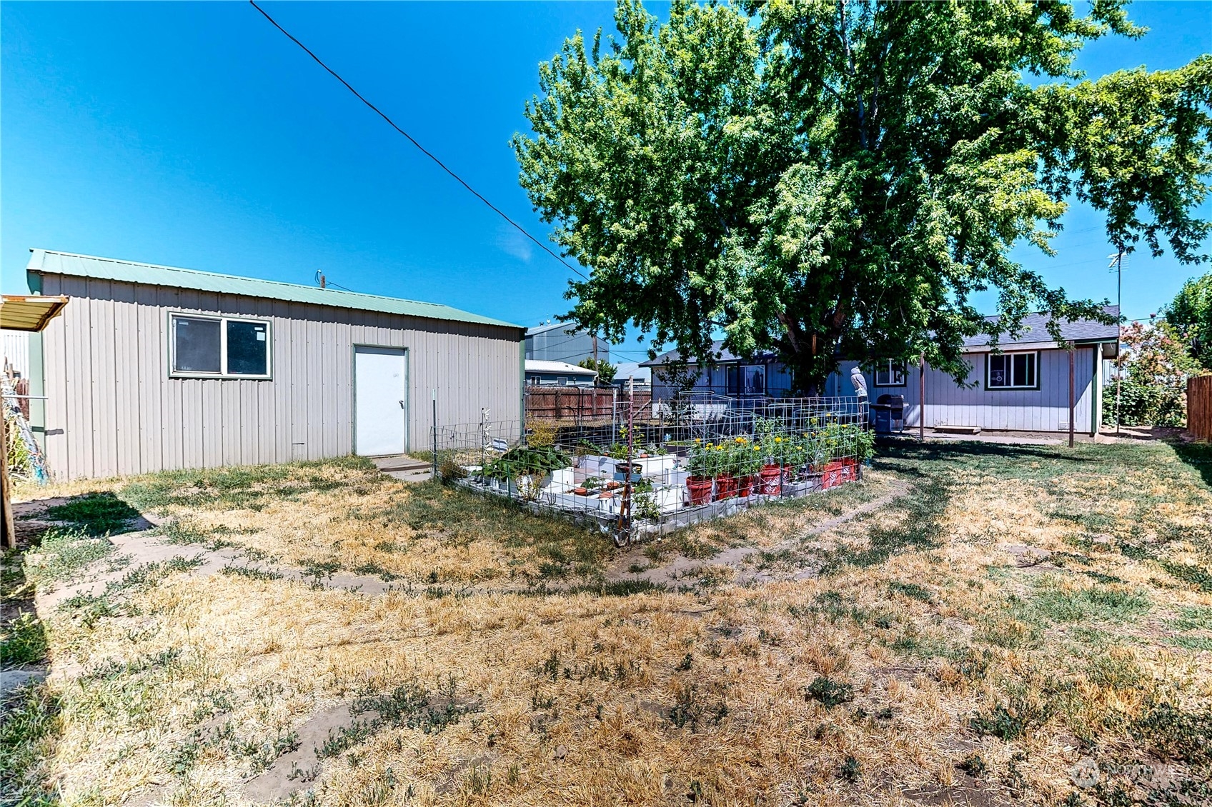 289 Main Street Touchet, WA 99360 - Photo 27 of 40 a view of a house with backyard and sitting area