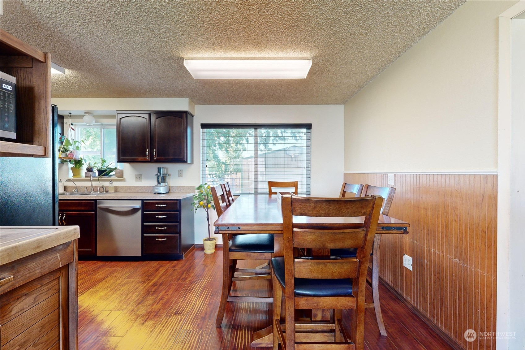 289 Main Street Touchet, WA 99360 - Photo 5 of 40 a kitchen with a table chairs and a refrigerator