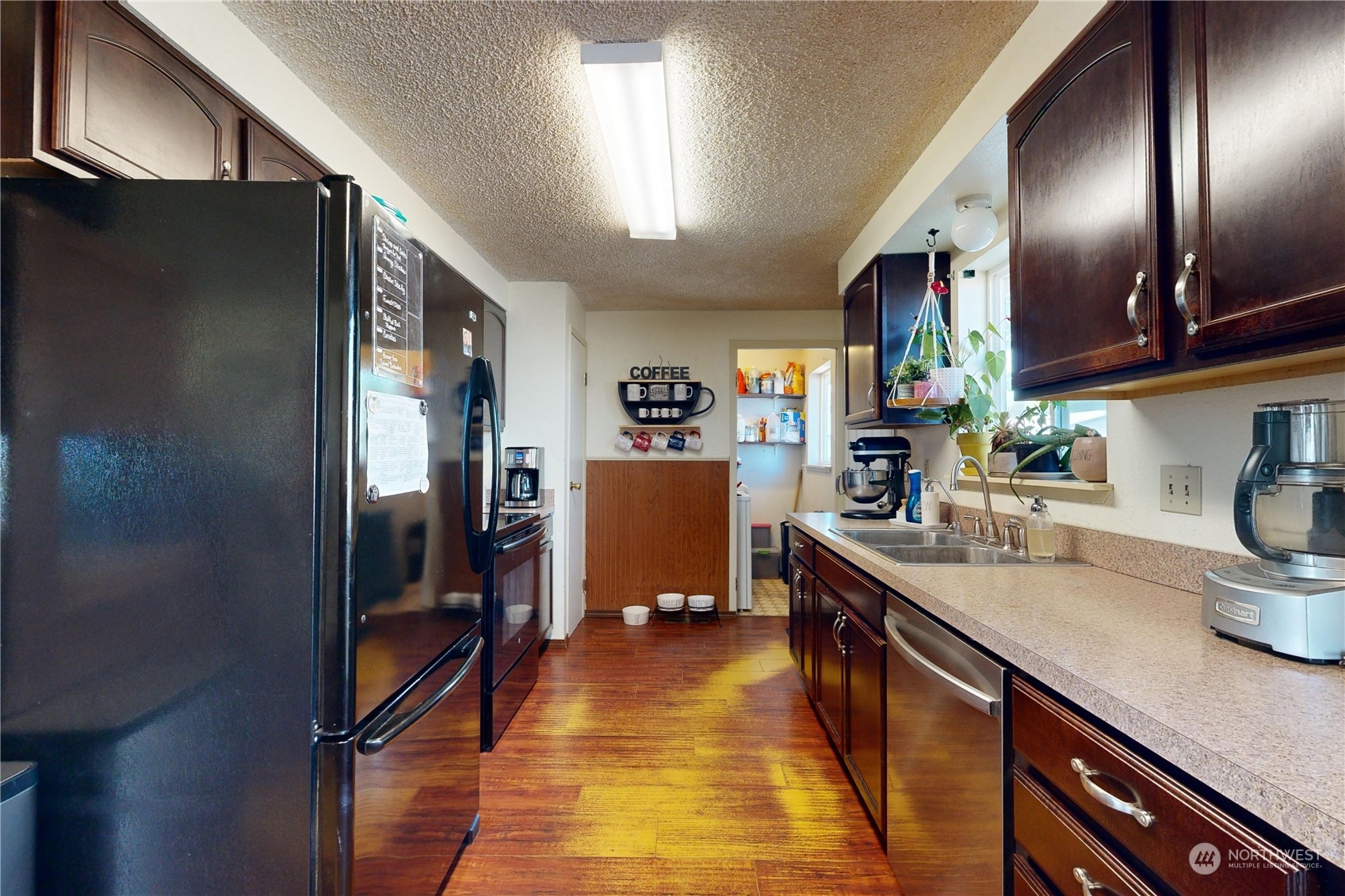 289 Main Street Touchet, WA 99360 - Photo 6 of 40 a kitchen with stainless steel appliances granite countertop a refrigerator and a stove