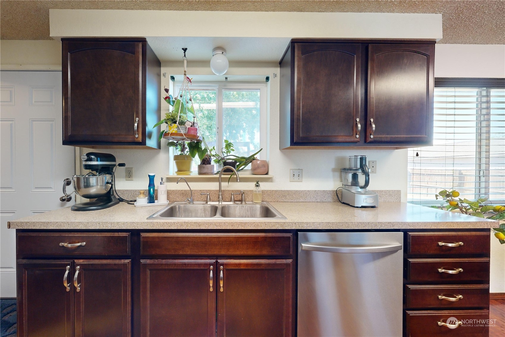 289 Main Street Touchet, WA 99360 - Photo 8 of 40 a kitchen with a sink and a refrigerator