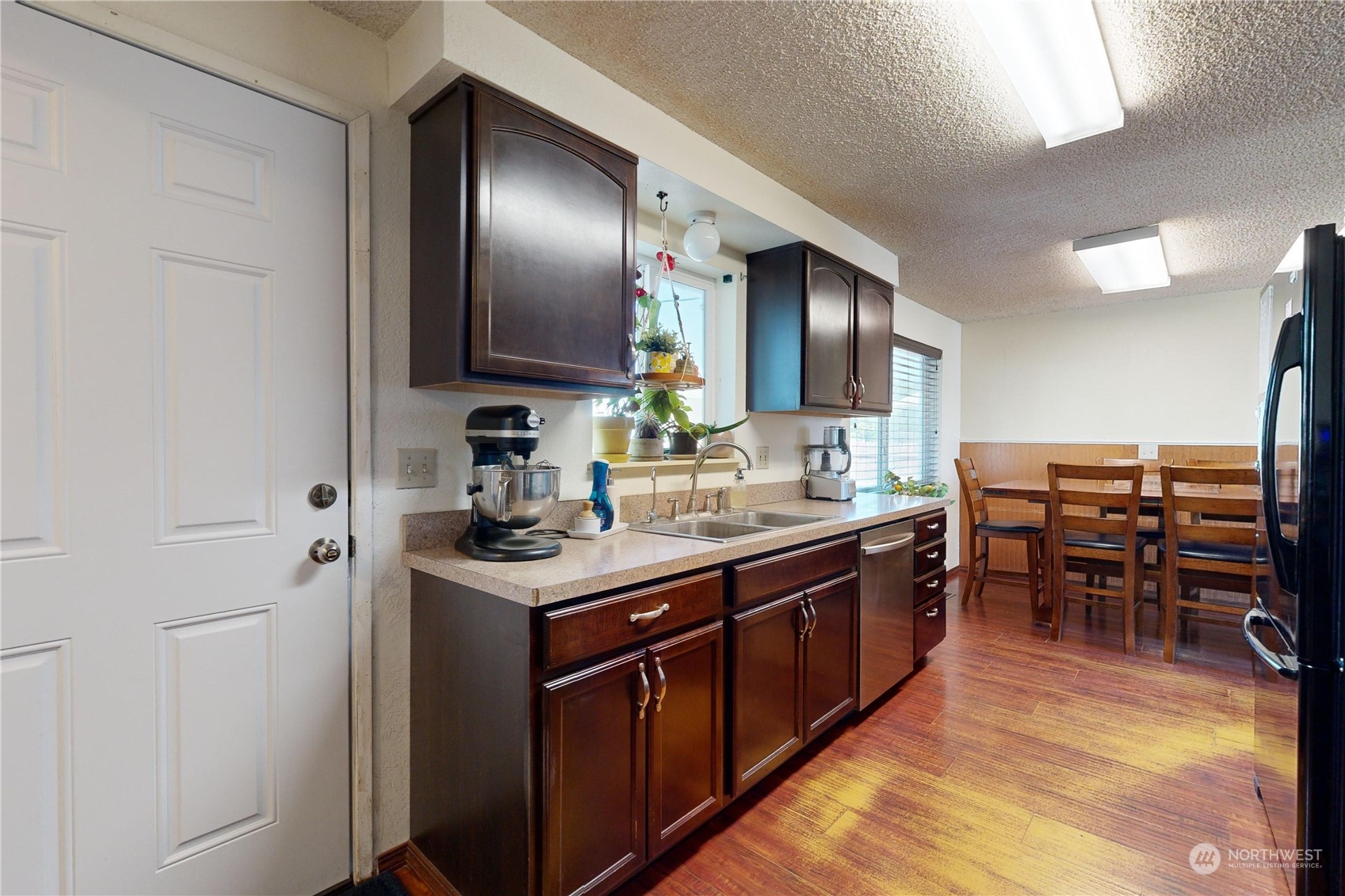 289 Main Street Touchet, WA 99360 - Photo 9 of 40 a kitchen with stainless steel appliances granite countertop a sink and stove