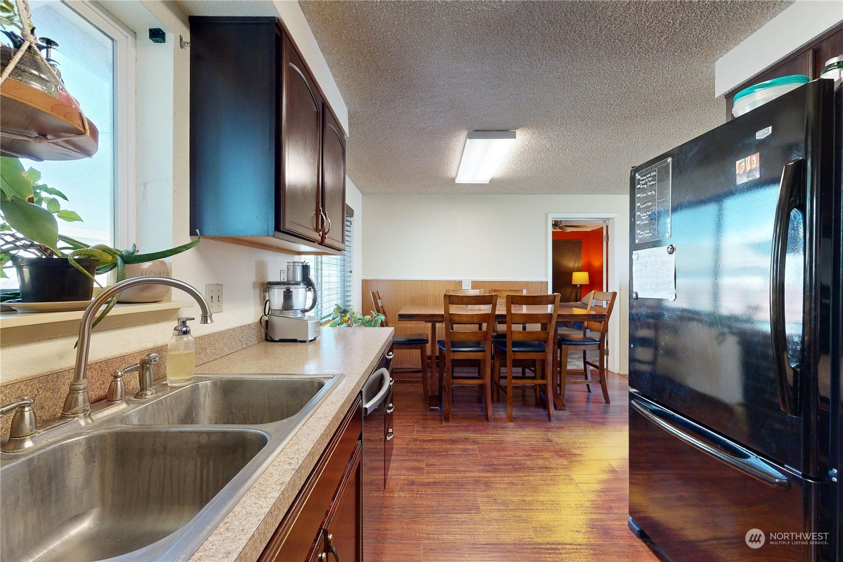 289 Main Street Touchet, WA 99360 - Photo 10 of 40 a kitchen with counter top space cabinets and stainless steel appliances