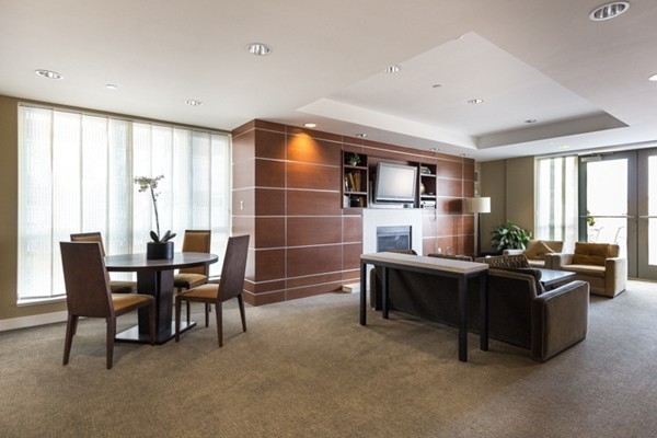 100 Station Landing, Unit 906 Medford, MA 02155 - Photo 23 of 28 a view of a dining room with furniture window and outside view
