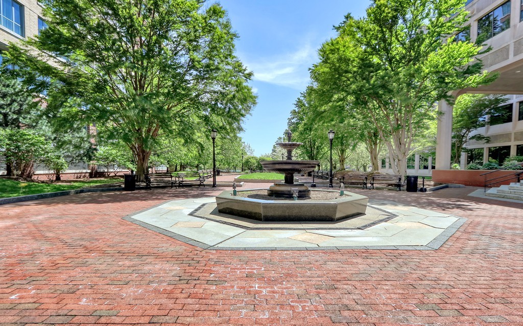 100 Station Landing, Unit 906 Medford, MA 02155 - Photo 25 of 28 a view of a swimming pool with sitting area