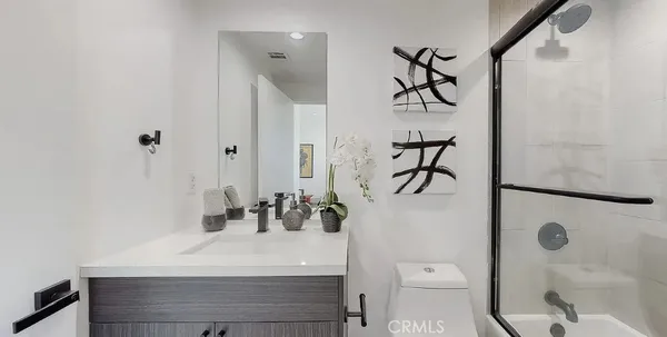 a kitchen with a sink and a stove