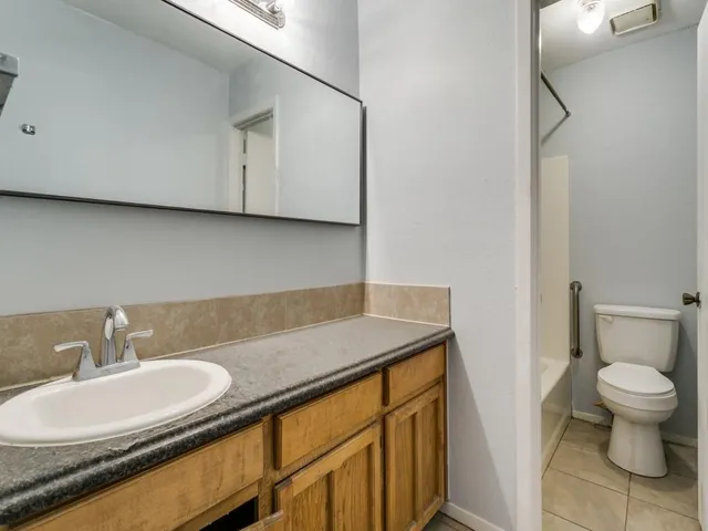 a bathroom with a sink and a toilet