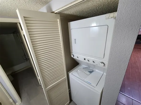 a bathroom with a sink and toilet
