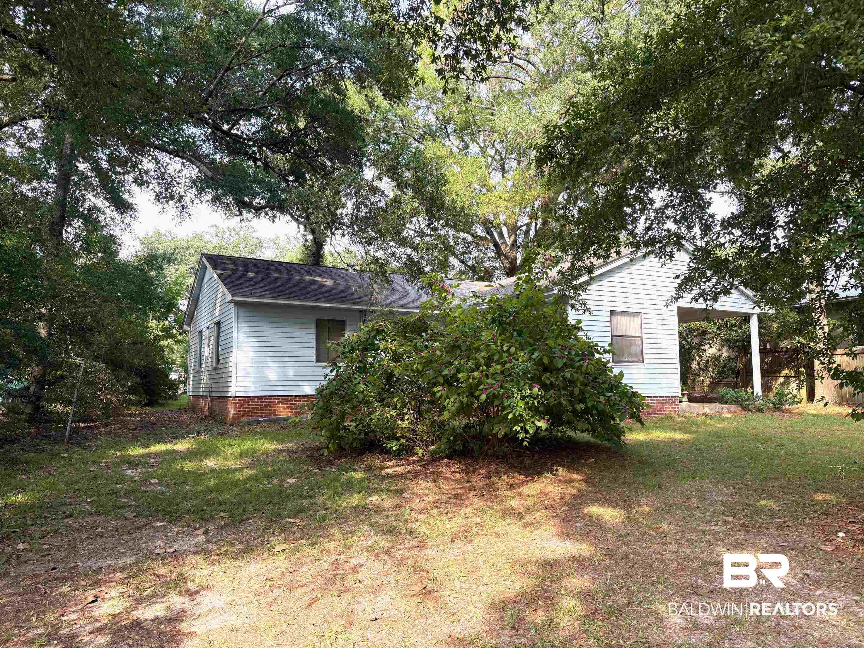 156 Pier Avenue Fairhope, AL 36532 - Photo 34 of 41 View of green lawn